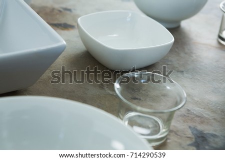 Various types of plastic bowl on table