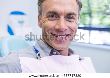 Portrait of man smiling at dental clinic