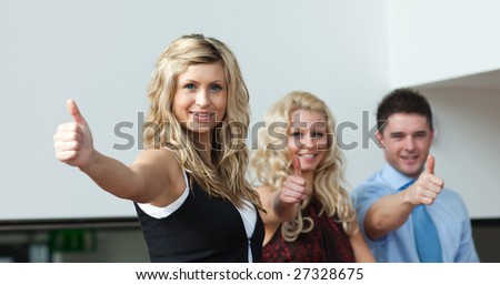 Three Person Business team showing positivity