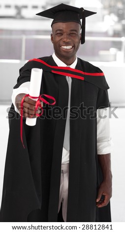 Man smilling at university graduation celebration