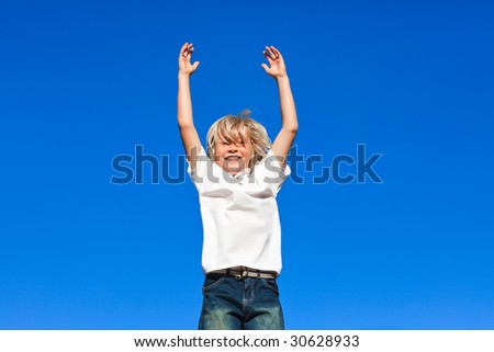 Young kid Jumping in the air