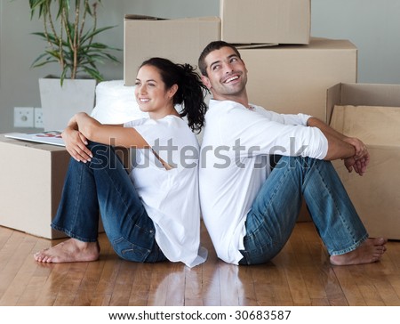 Happy Young Couple Moving House
