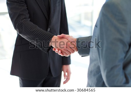 Business people shaking hands after a meeting
