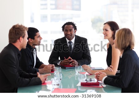 International business people discussing in a meeting