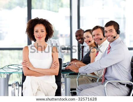 Multi-ethnic business team working in a call center