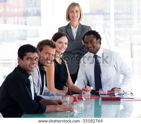 International business team smiling at the camera in office