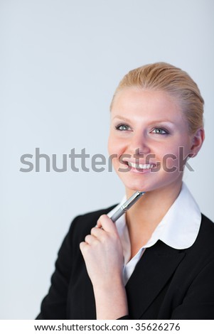 Young attractive Businesswoman with pen in her hand
