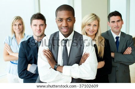 Business people headed by a man in an office