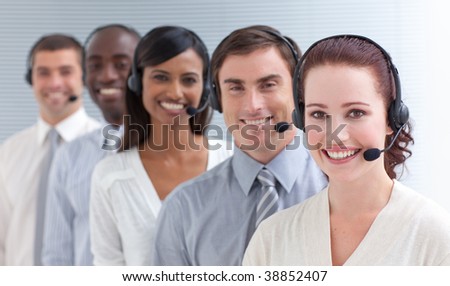 Business people working in a call center standing in a line