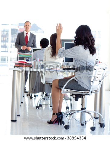 Busineswoman asking a question to a manager in a meeeting office