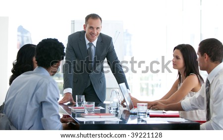 Business people studying a new business plan in a meeting