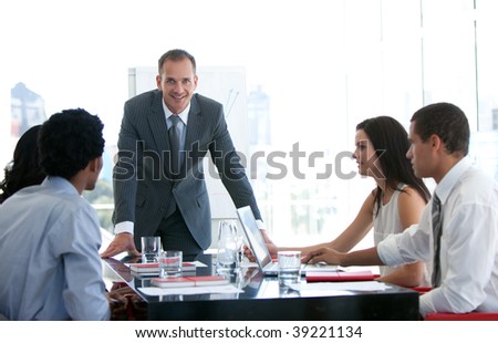 Business people talking about a new business plan in office