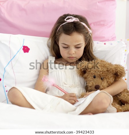 Little Girl Sitting In Bed
