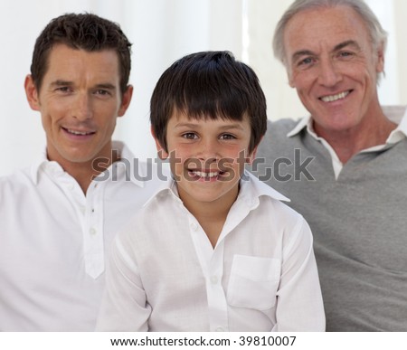 Smiling portrait of son, father and grandfather