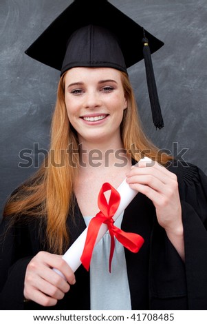 Portrait of teenage Girl Celebrating Graduation in the class