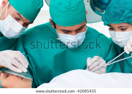 Portrait of surgeons in operative room. Medical concept