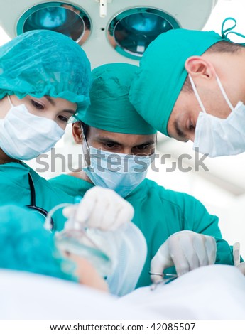Close-up of surgeons in operative room. Medical concept