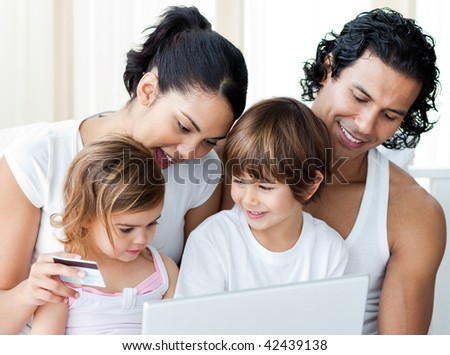 Close-up of a family shopping online at home