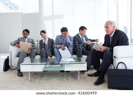 Business people sitting and waiting for a job interview. Business concept.
