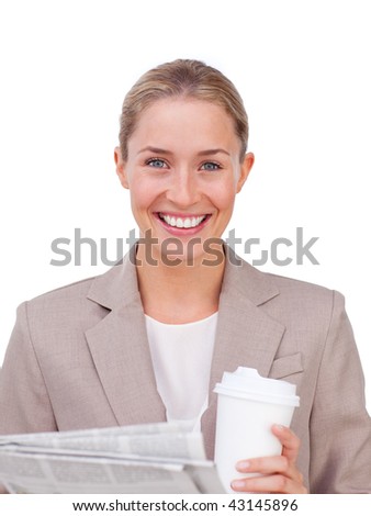 Charismatic businesswoman drinking a coffee reading a newspaper against a white background