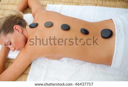 Portrait of woman getting spa treatment in a health center
