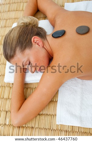 Close-up of woman getting spa treatment in a health center