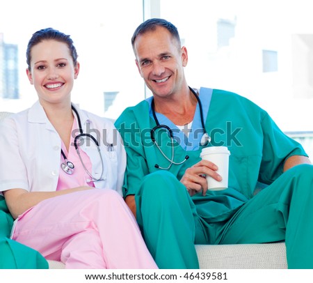 Two doctors relaxing in the staff room in a hospital