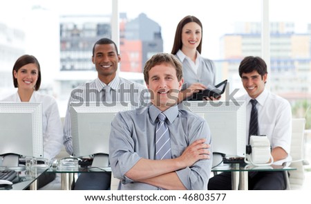 Portrait of a positive business team at work in the office