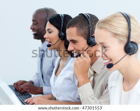 Young business people working in a call center in the office