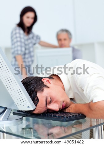 Portrait of a tired businessman sleeping in his office