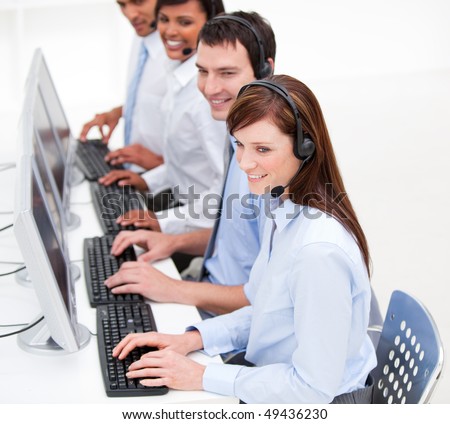 Positive customer service agents at work against  a white background