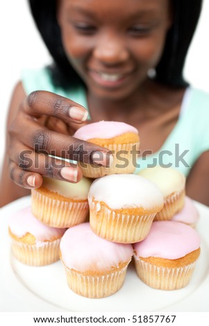 Afro-american woman taking a cake against a white background