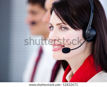 Concentrated sales representative team with an headset in the office