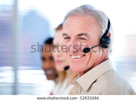 Self-assured sales representative team with headsets against white background