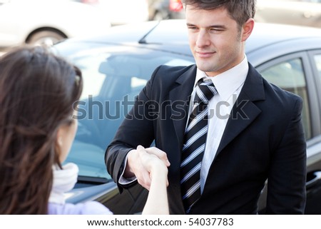 Self-assured businessman meeting his colleague in the street