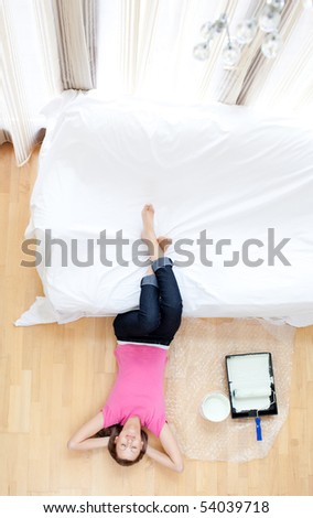 Exhausted woman have a break in her living-room