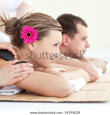 Relaxed young couple enjoying a Spa treatment in a Spa center