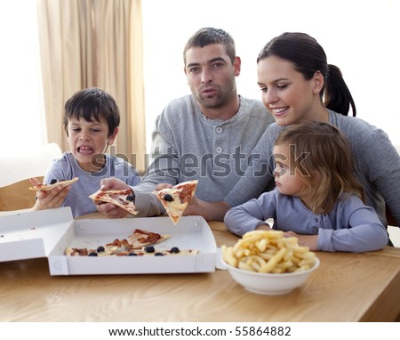 Family Eating Pizza