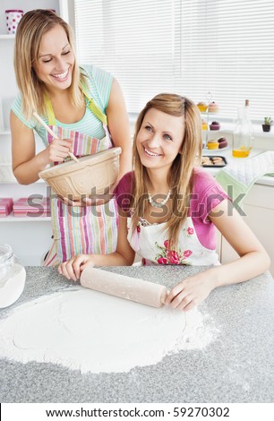 Animated female friends baking togehter in the kitchen