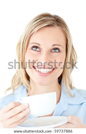 Cheerful businesswoman holding a cup of coffee against a white background