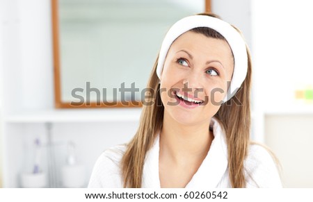 Smiling woman wearing headband in the bathroom at home