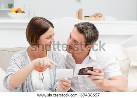Future parents looking at X-ray at home