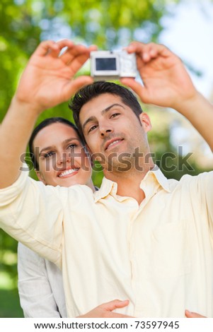Couple taking a photo of themselves