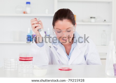 Cute scientist preparing a sample