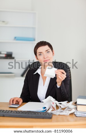 Portrait of an office worker doing accountancy in her office