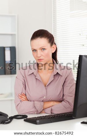 A businesswoman sitting in her office