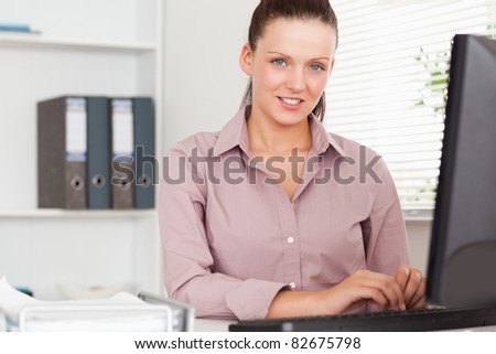 A nice businesswoman sitting in her office