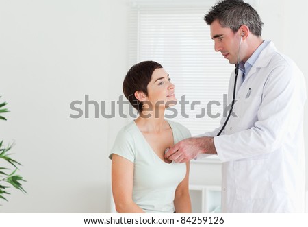 doctor examining female