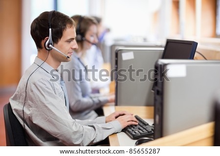 Customer assistant working in a call center