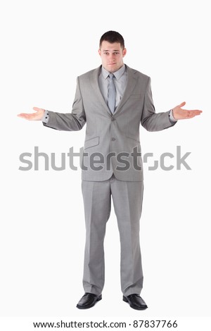 Portrait of a lost businessman against a white background